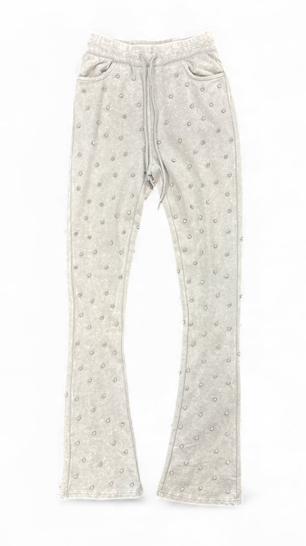 Rebel Denim Diamond fleece stack flared jogger pants in grey, with a relaxed fit and stacked design, shown on a model.