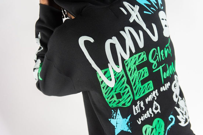 Black Rebel Minds 'Can't Be' fleece cropped hoodie with drawstring hood and front pocket, casual streetwear style.