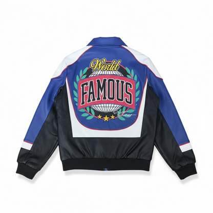Royal blue 8IGHTH/DSTRKT Master Mind varsity jacket with contrasting sleeves and embroidered logo details.
