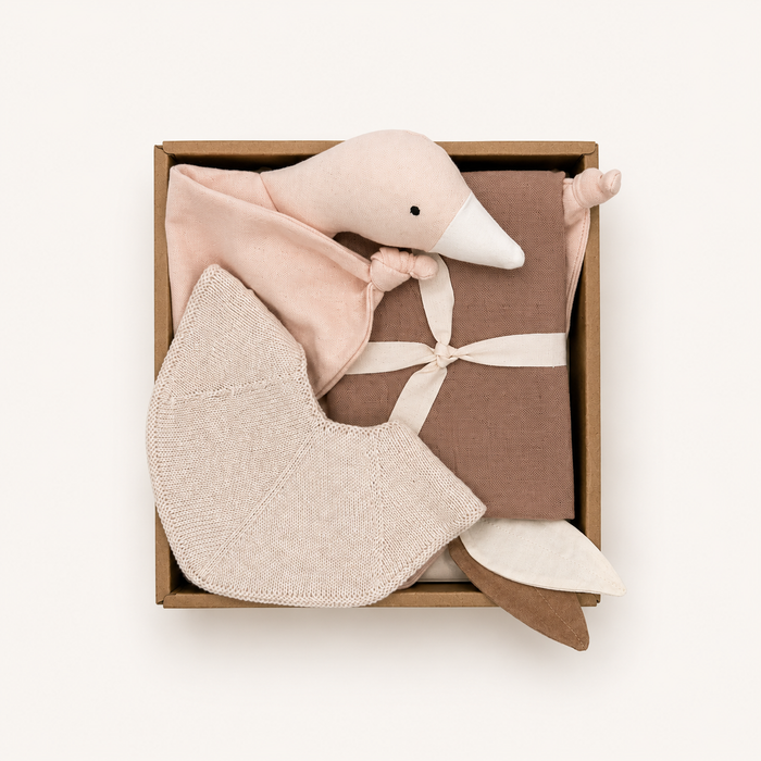 Organic baby gift box with soft pink baby essentials by Saga Copenhagen