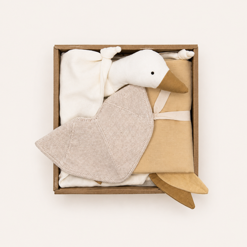 Baby Gift Box with organic cuddle cloth, muslin cloth and knitted baby bib in soft Scandinavian colours by Saga Copenhagen.