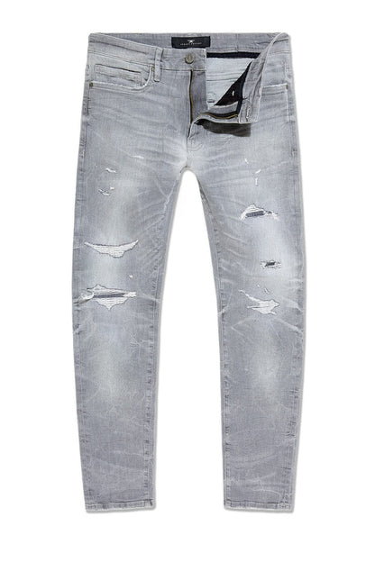 Jordan Craig Collins Rip and Repair denim jeans in cement wash with distressed details and classic fit.