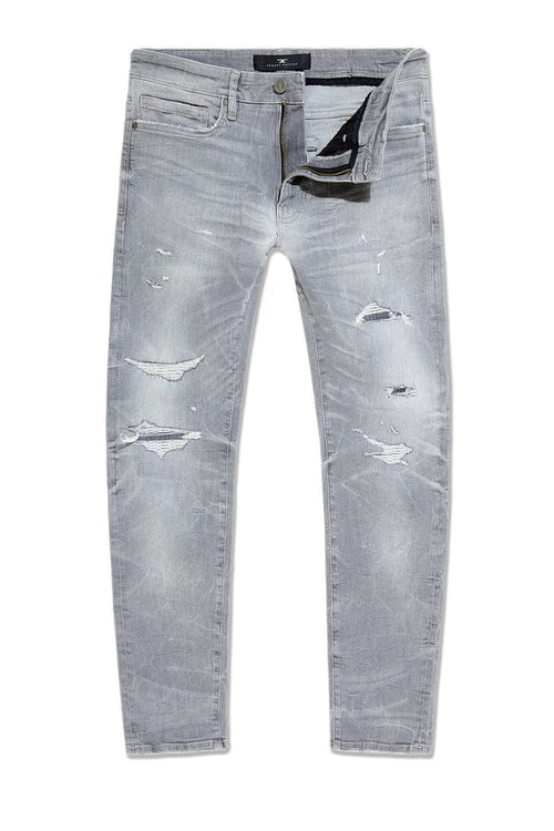 Jordan Craig Collins Rip and Repair denim jeans in cement wash with distressed details and classic fit.