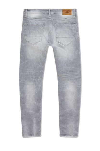 Jordan Craig Collins Rip and Repair denim jeans in cement wash, showcasing distressed style and casual fit.