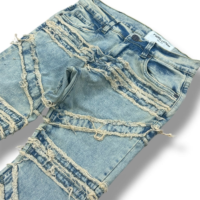 FWRD Crossover Stacked Denim jeans in ice tint, folded display showcasing high-waisted denim with stacked design and faded wash.