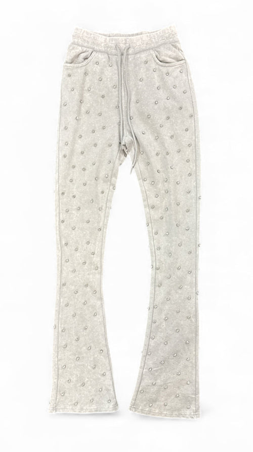 Rebel Denim Diamond fleece stack flared jogger pants in grey, with a relaxed fit and stacked design, shown on a model.