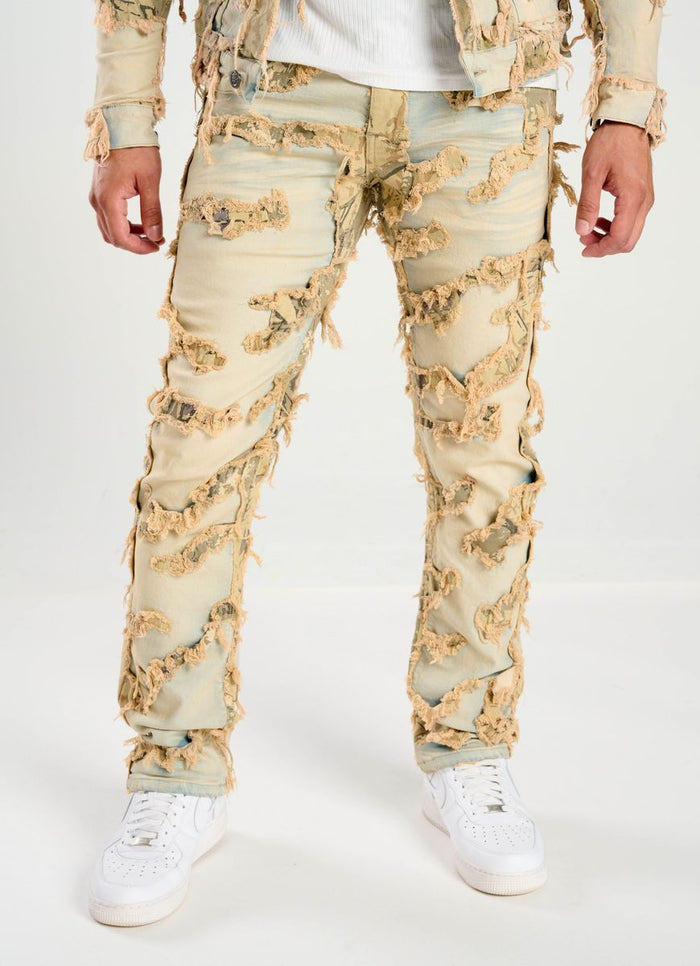 Taker distressed pattern slim straight denim jeans in tint, showing the faded, worn look and slim fit style.